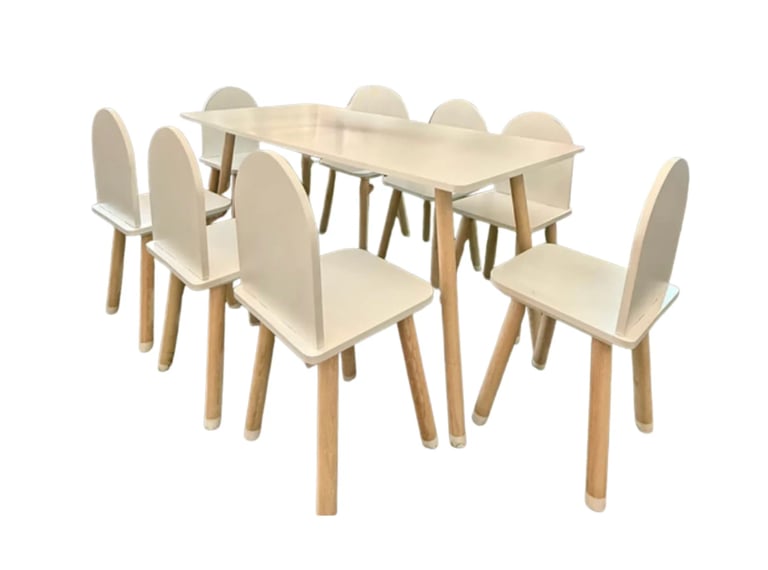 Modern dining set with light wood table and six cream-colored chairs with rounded backrests