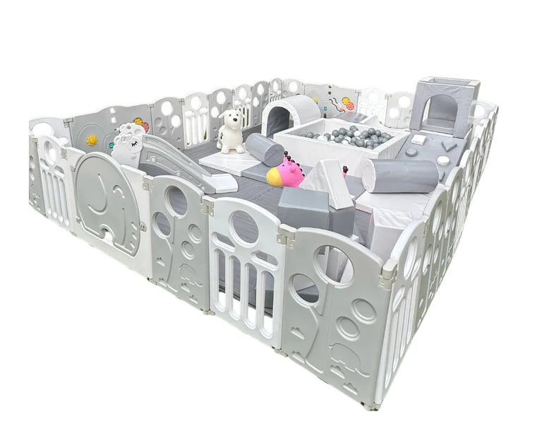 Large modular white play pen with various toys, activity stations, and storage compartments for babies and toddlers